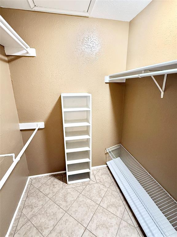 4545 North O'Connor Road, Unit 2251 Irving, TX 75062 - Photo 11 of 25 a view of walk in closet with empty racks