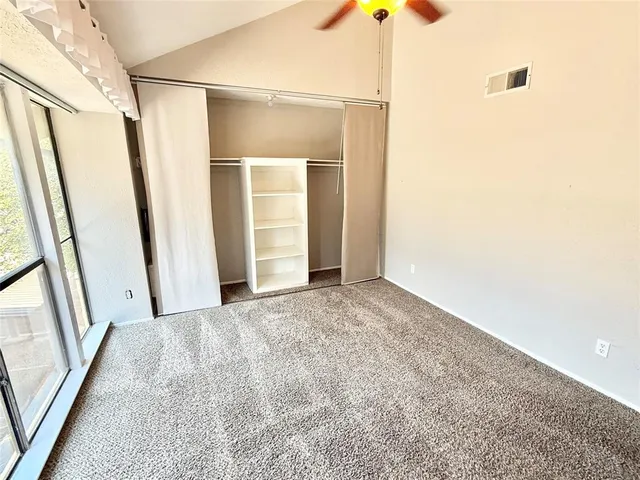 an empty room with windows