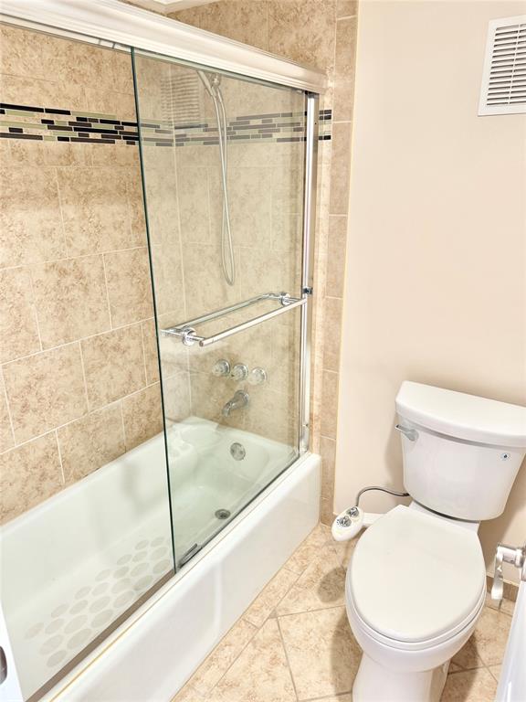 4545 North O'Connor Road, Unit 2251 Irving, TX 75062 - Photo 22 of 25 a bathroom with a toilet and a shower