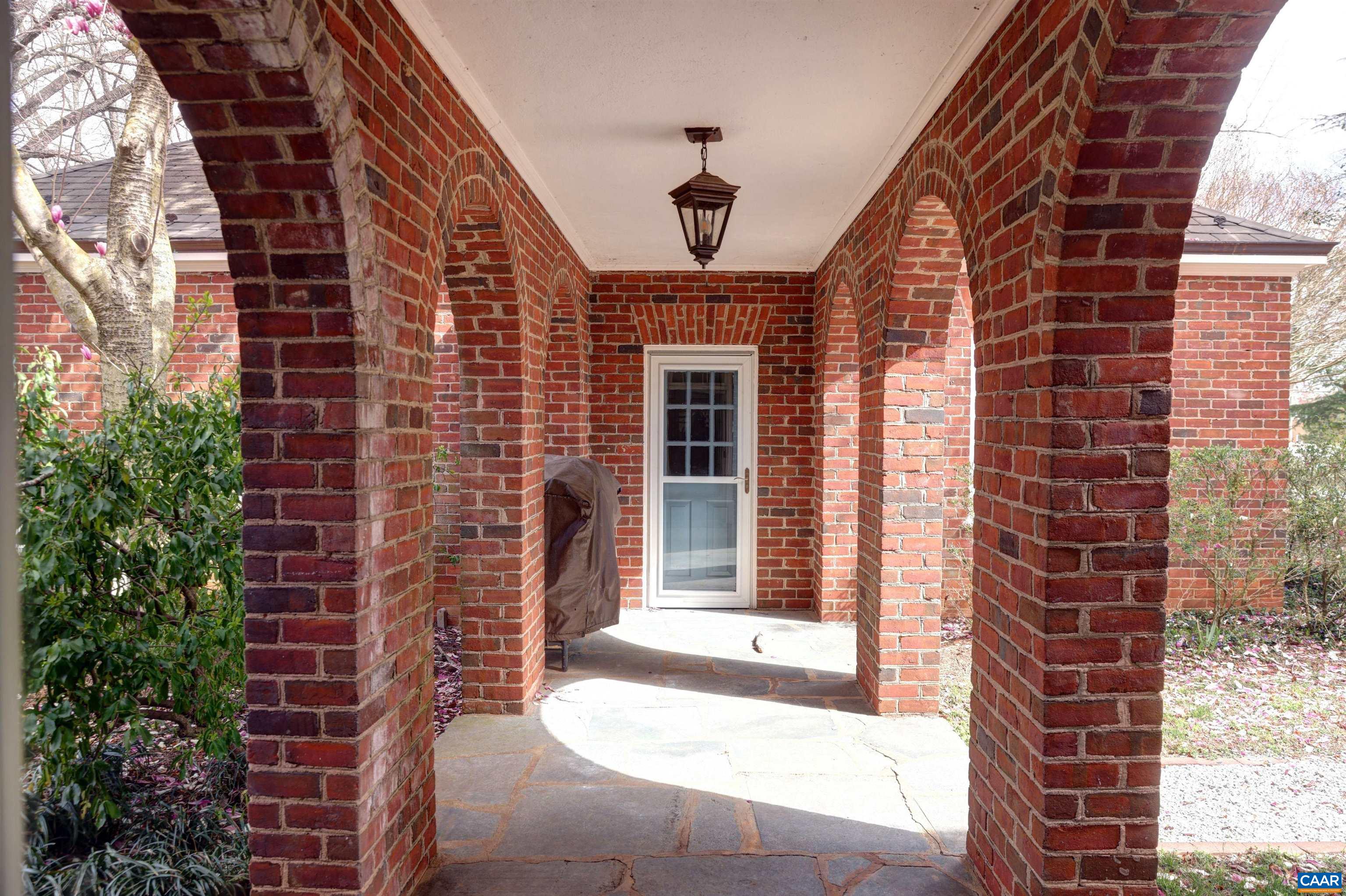 3466 Morgantown Road Charlottesville, VA 22903 - Photo 29 of 35 a view of a brick house with a large windows