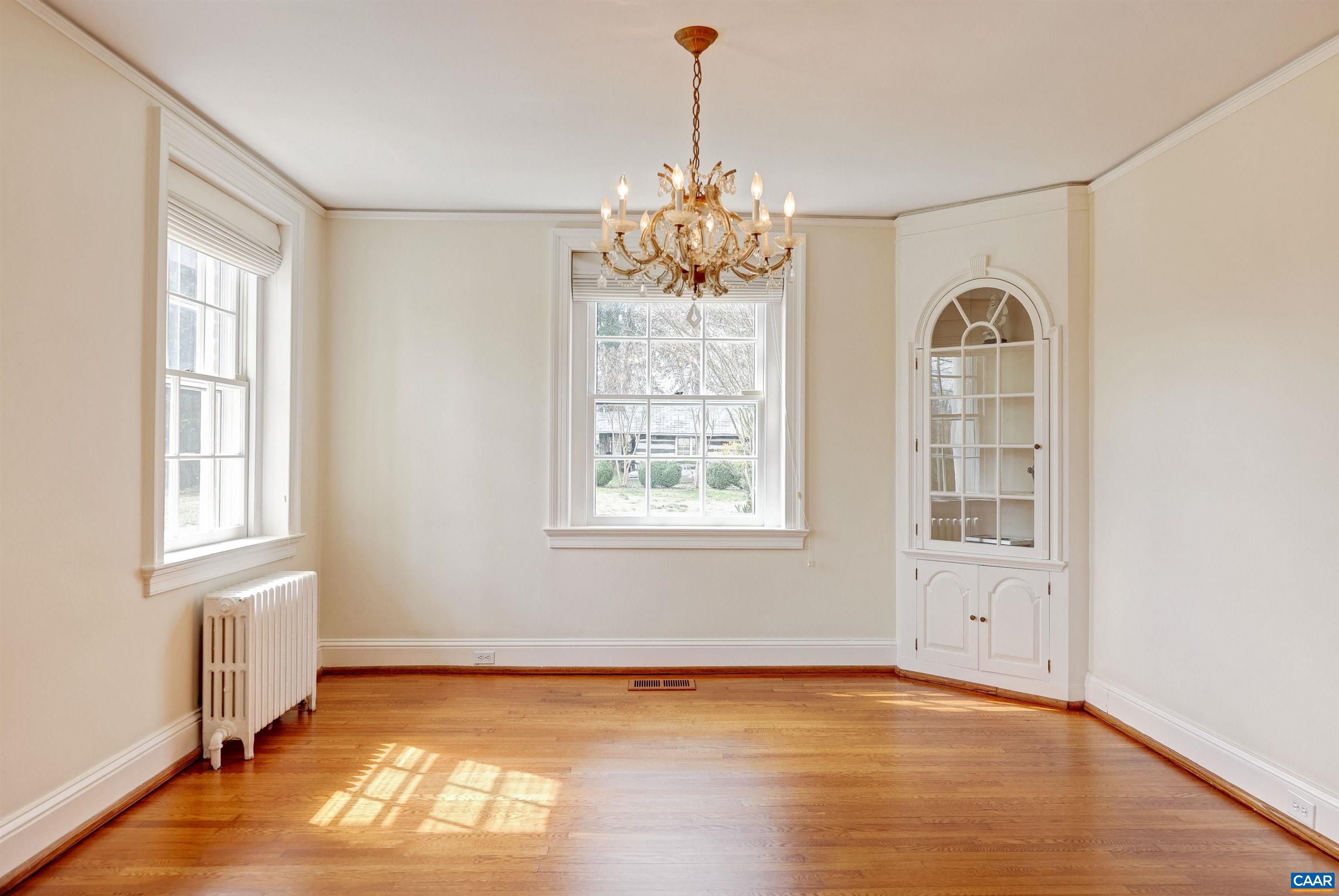 3466 Morgantown Road Charlottesville, VA 22903 - Photo 5 of 35 a view of a room with wooden floor and windows