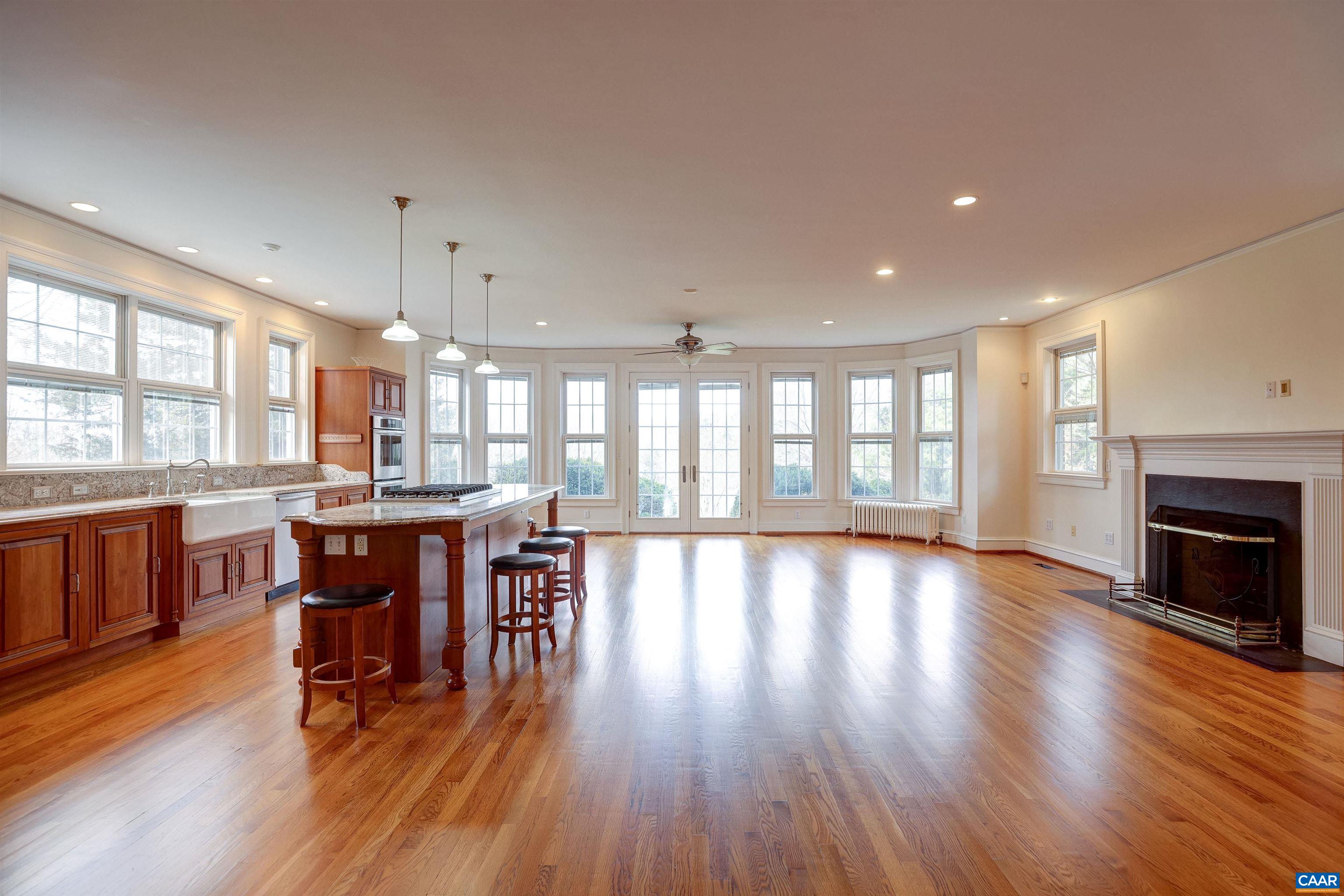 3466 Morgantown Road Charlottesville, VA 22903 - Photo 6 of 35 a view of a dining room with furniture window and wooden floor