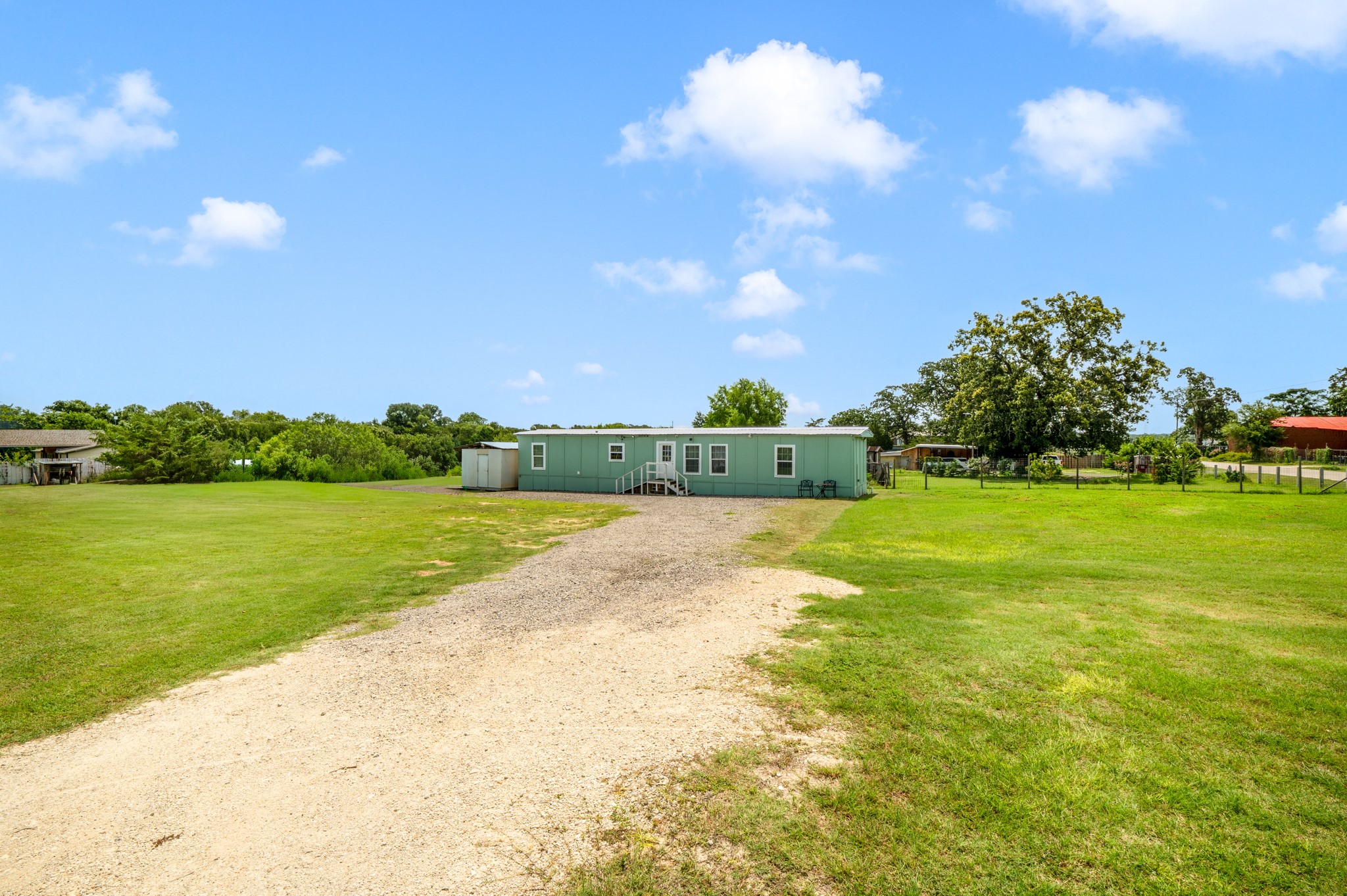 235 Thompson Road Dale, TX 78616 - Photo 35 of 36 View from edge of property looking at the front of the house.