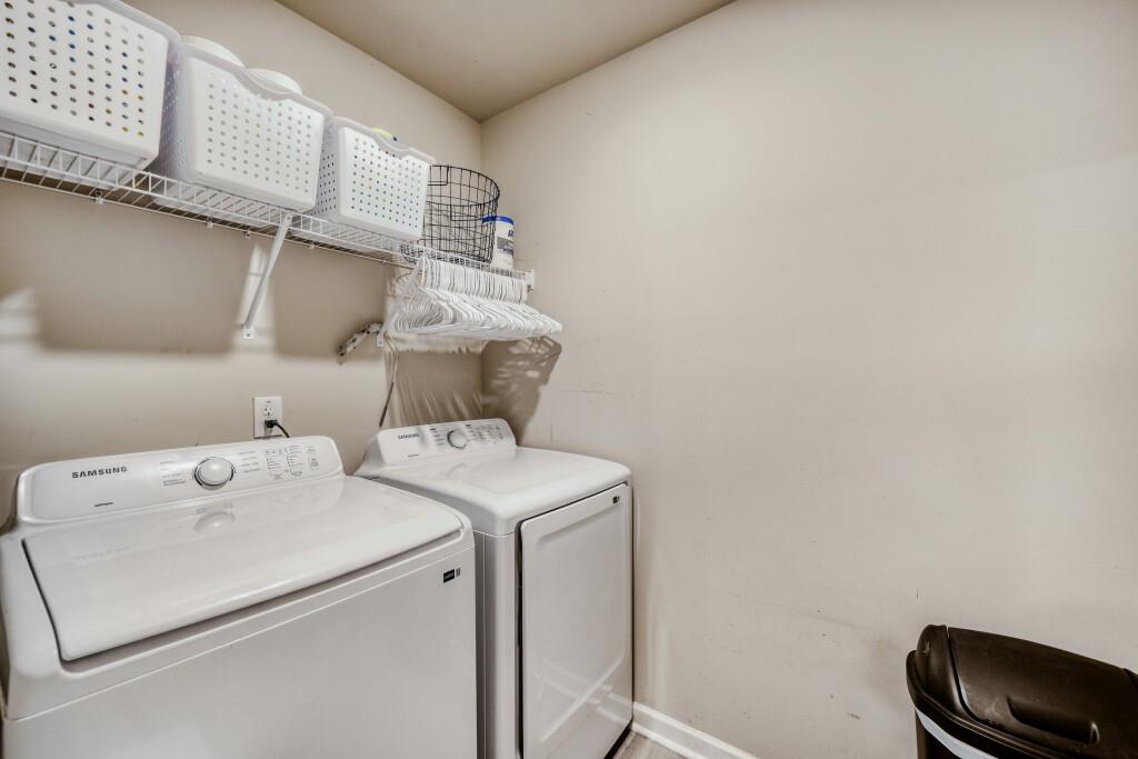 1526 Woodvale Street Hampton, GA 30228 - Photo 27 of 31 a utility room with dryer and washer