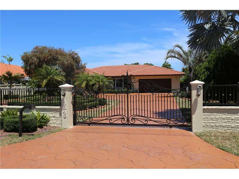 3845 Southwest 128th Avenue Miami, FL 33175 - Photo 1 of 35 a front view of a house with a garden