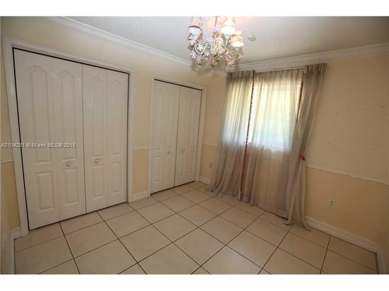 3845 Southwest 128th Avenue Miami, FL 33175 - Photo 19 of 35 a view of a chandelier in a room