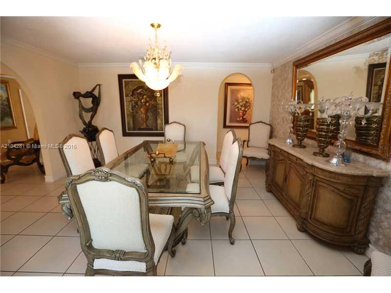 3845 Southwest 128th Avenue Miami, FL 33175 - Photo 8 of 35 a view of a dining room with furniture