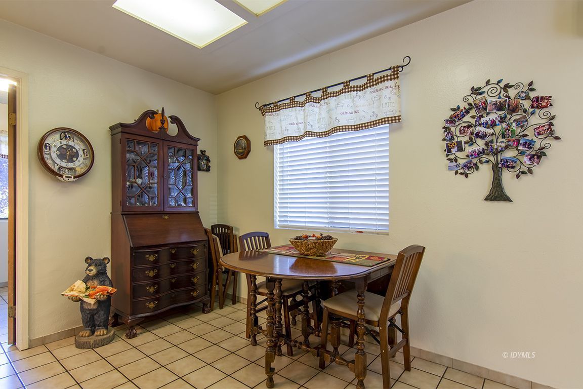 26833 Idyllwild Road Idyllwild, CA 92549 - Photo 19 of 38 a dining room with furniture and window