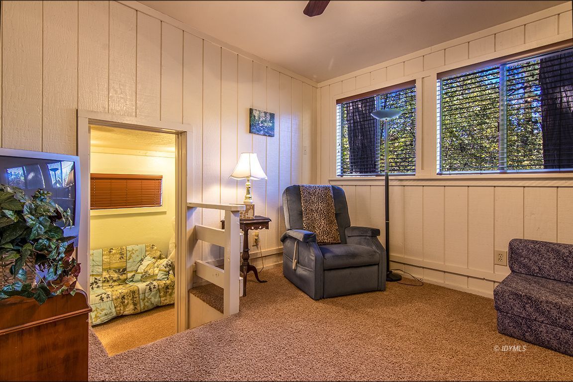 26833 Idyllwild Road Idyllwild, CA 92549 - Photo 30 of 38 a living room with furniture and a window