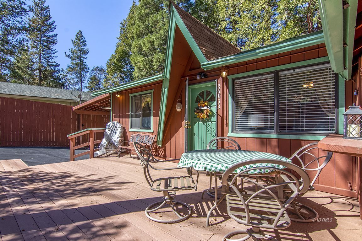 26833 Idyllwild Road Idyllwild, CA 92549 - Photo 8 of 38 a patio with table and chairs