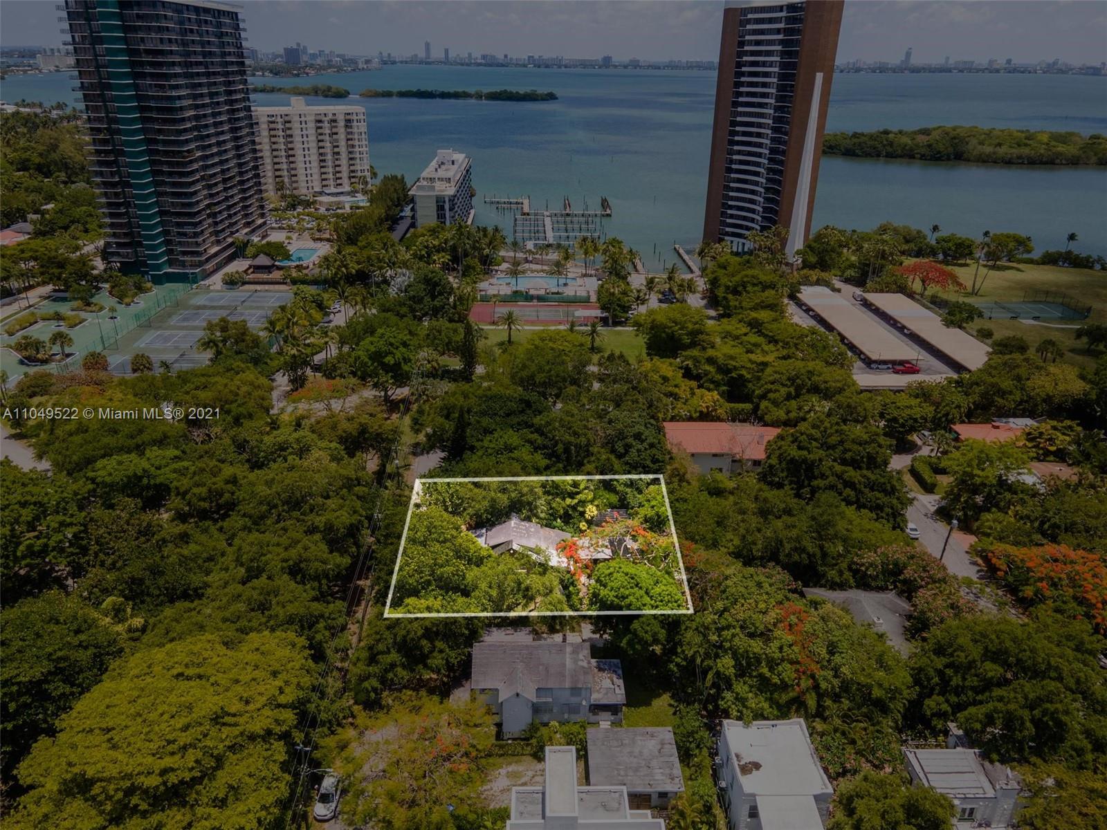 a bird view of house and outdoor space