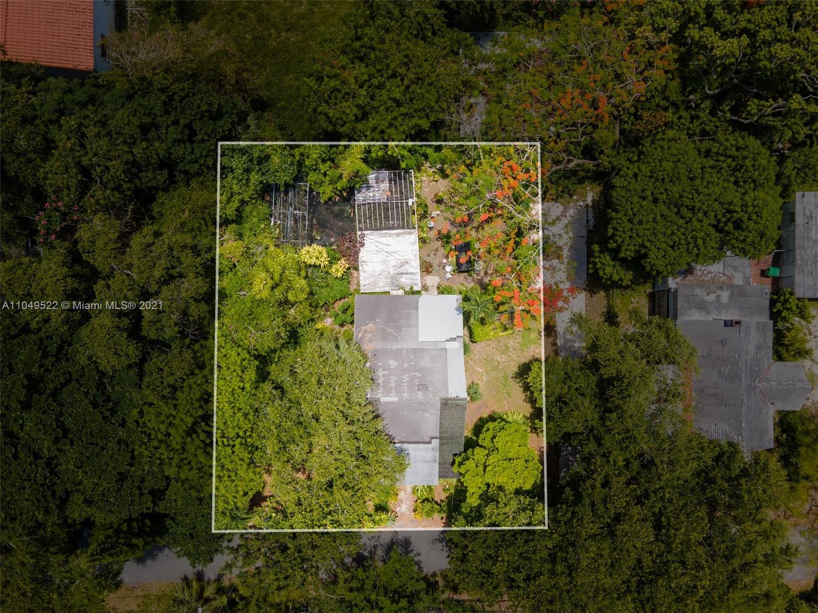 720 Northeast 68th Street Miami, FL 33138 - Photo 2 of 8 an aerial view of residential house with outdoor space and swimming pool