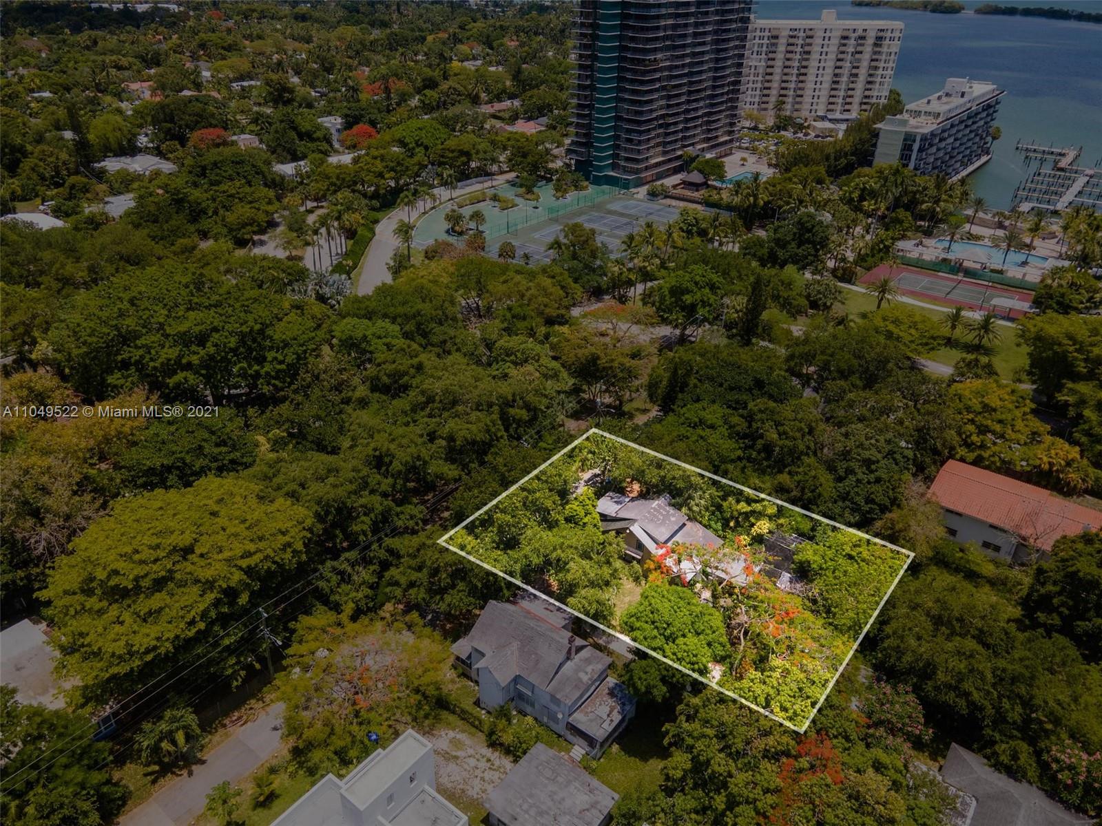 720 Northeast 68th Street Miami, FL 33138 - Photo 3 of 8 an aerial view of a yard