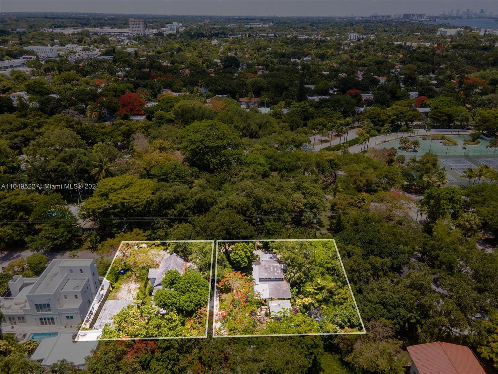 720 Northeast 68th Street Miami, FL 33138 - Photo 8 of 8 an aerial view of house with yard swimming pool and outdoor seating