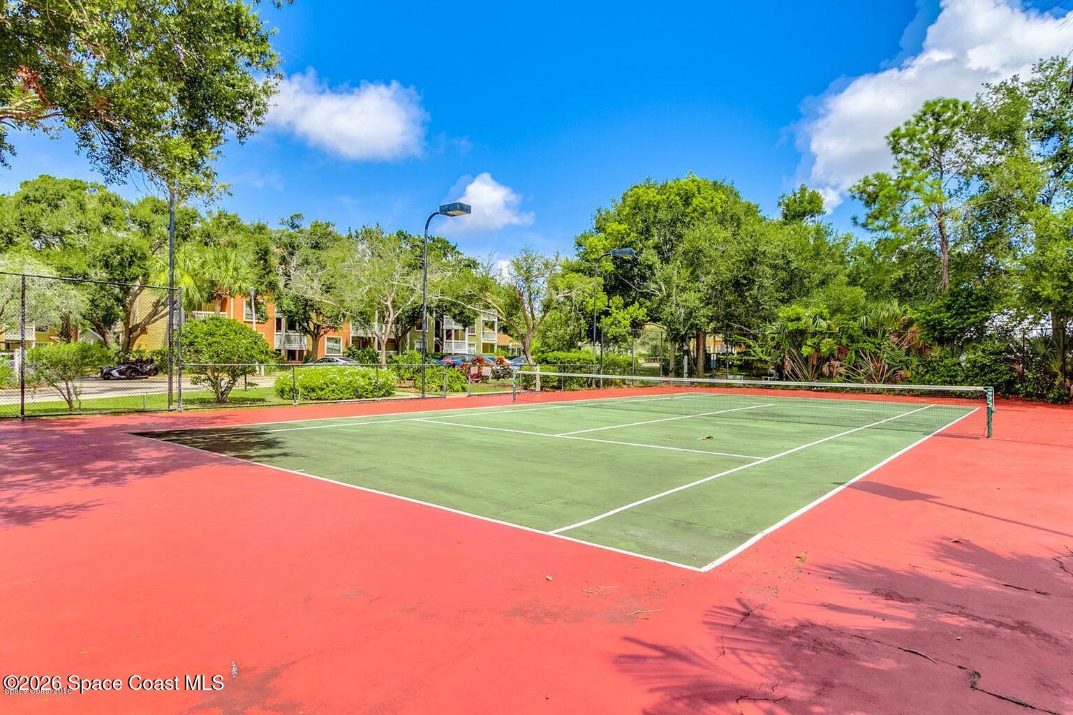 225 South Tropical Trail, Unit 515 Merritt Island, FL 32952 - Photo 29 of 30 sunset tennis