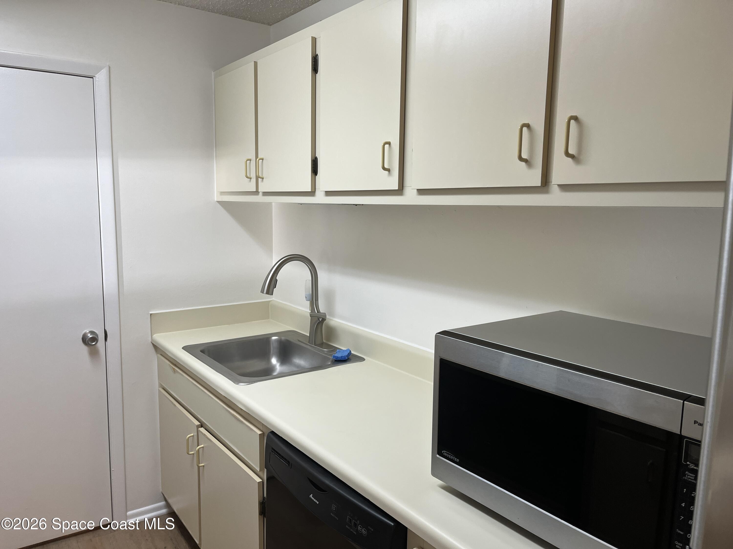 225 South Tropical Trail, Unit 515 Merritt Island, FL 32952 - Photo 7 of 30 IMG_0593