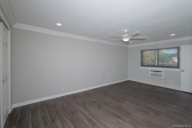 9 Brentwood Road, Unit 4A Bay Shore, NY 11706 - Photo 8 of 11 wooden floor in an empty room with a window