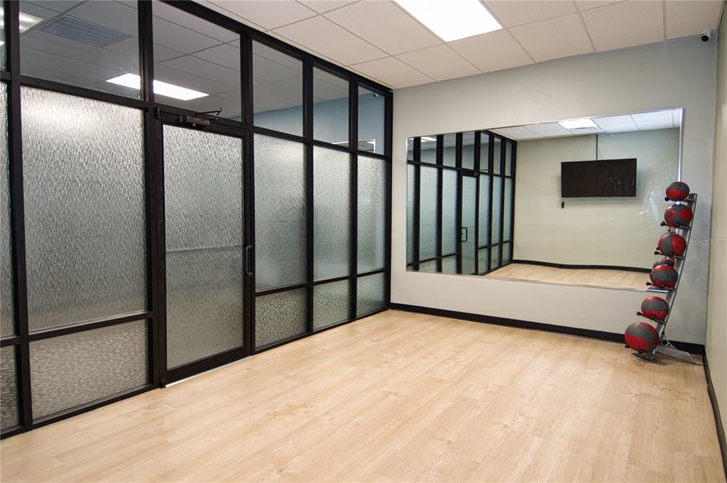 1793 Hampton Lane, Unit 110 Palm Harbor, FL 34683 - Photo 24 of 35 a view of a livingroom with a staircase