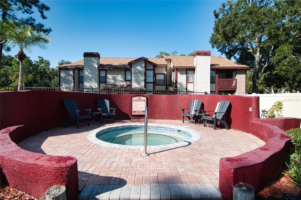 1793 Hampton Lane, Unit 110 Palm Harbor, FL 34683 - Photo 26 of 35 a outdoor space with patio