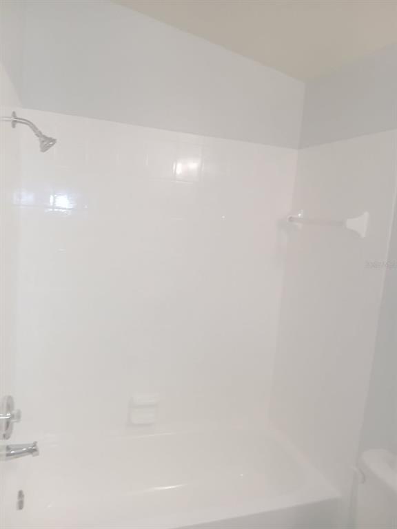 1793 Hampton Lane, Unit 110 Palm Harbor, FL 34683 - Photo 9 of 35 a view of an empty room