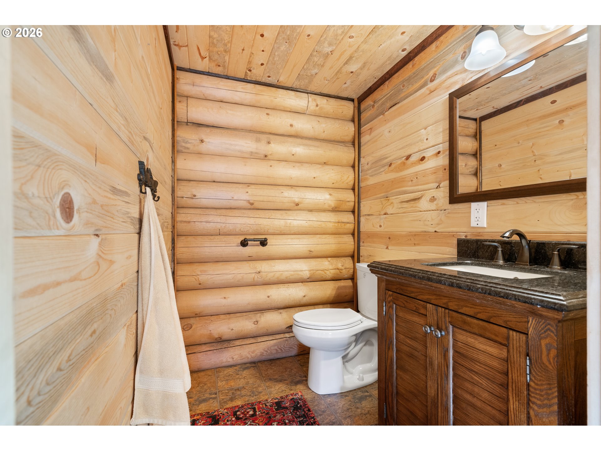 74091 Thornhollow Road Adams, OR 97810 - Photo 32 of 48 a bathroom with a granite countertop sink toilet and shower