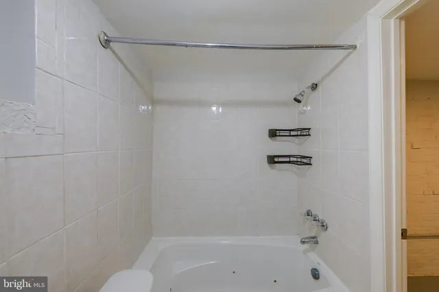 a bathroom with a bathtub