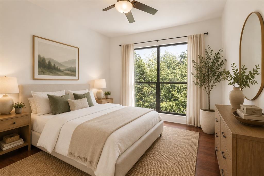 4414 Cedar Springs Road, Unit 320 Dallas, TX 75219 - Photo 11 of 17 a bedroom with a large bed and a large window