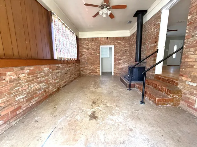a view of an entryway with a fireplace