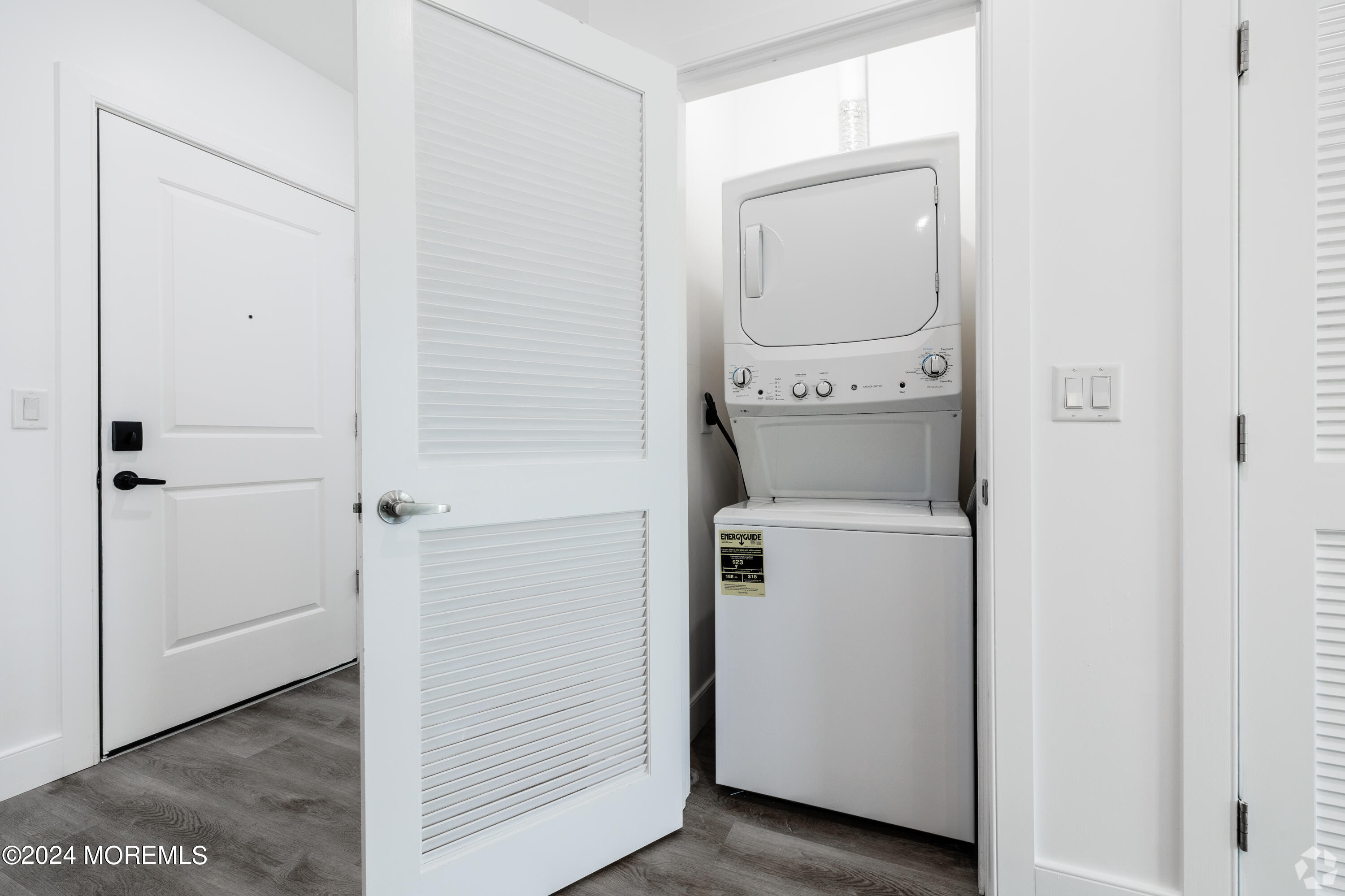 126 Main Street, Unit 410 Matawan, NJ 07747 - Photo 11 of 13 a utility room with dryer and washer