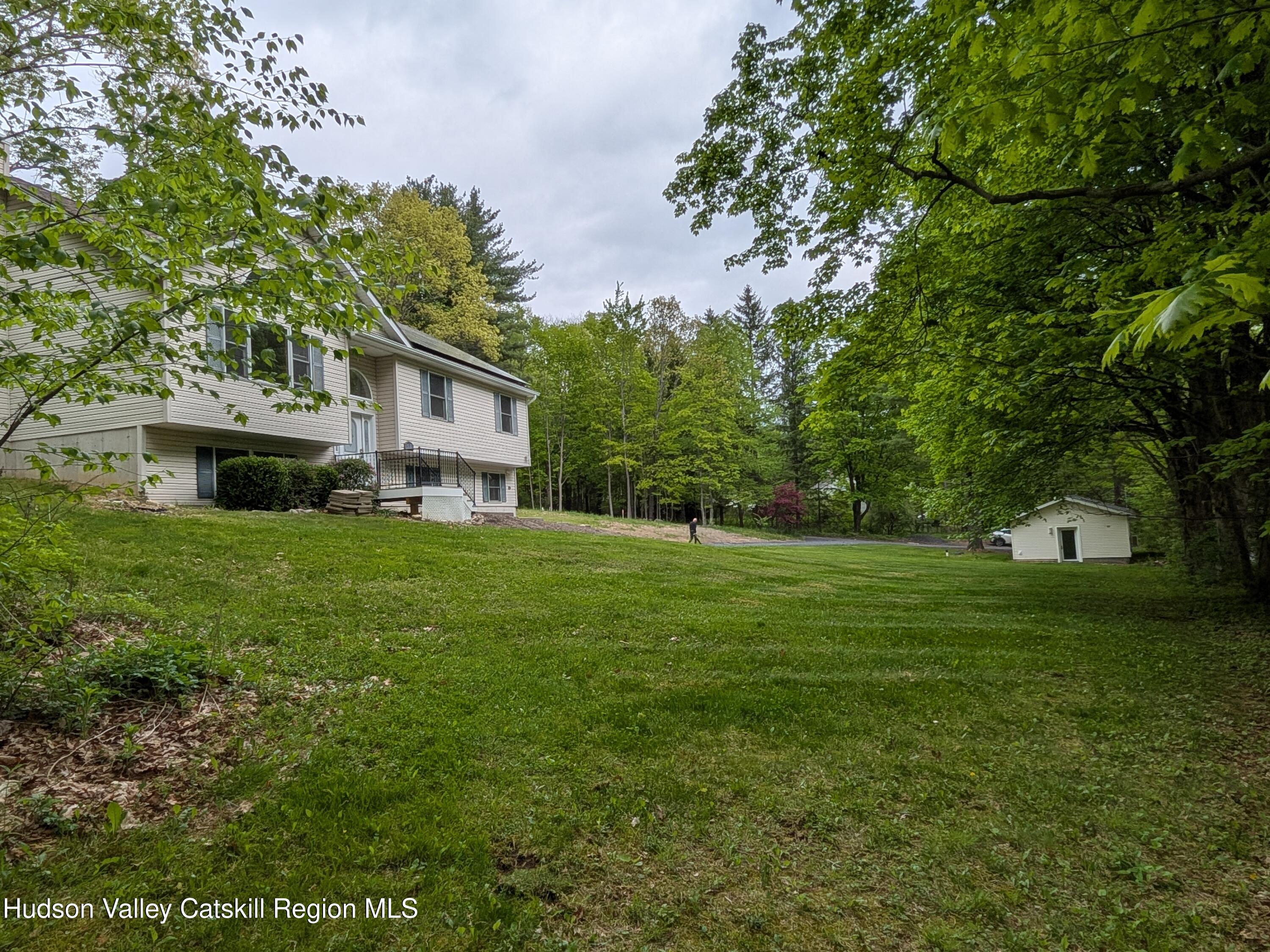 513 South Mountain Road Gardiner, NY 12525 - Photo 56 of 63 a front view of a house with garden