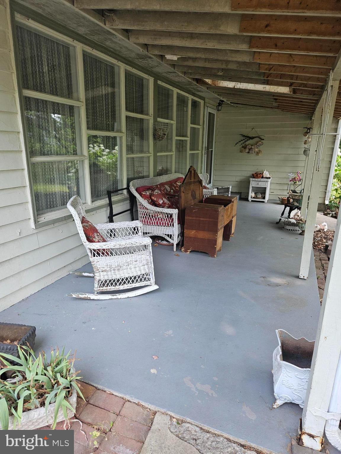 7122 Neuman Street Springfield, VA 22150 - Photo 3 of 35 Enjoy this front porch w skylight