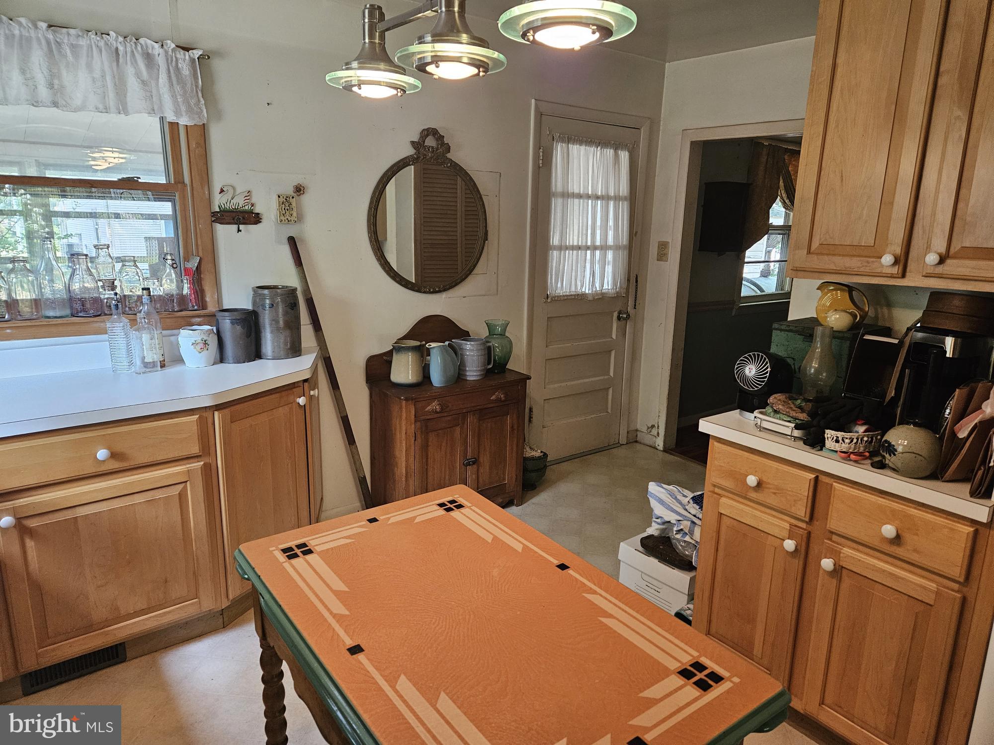 7122 Neuman Street Springfield, VA 22150 - Photo 9 of 35 kitchen to dinning room and laundry/sunroom