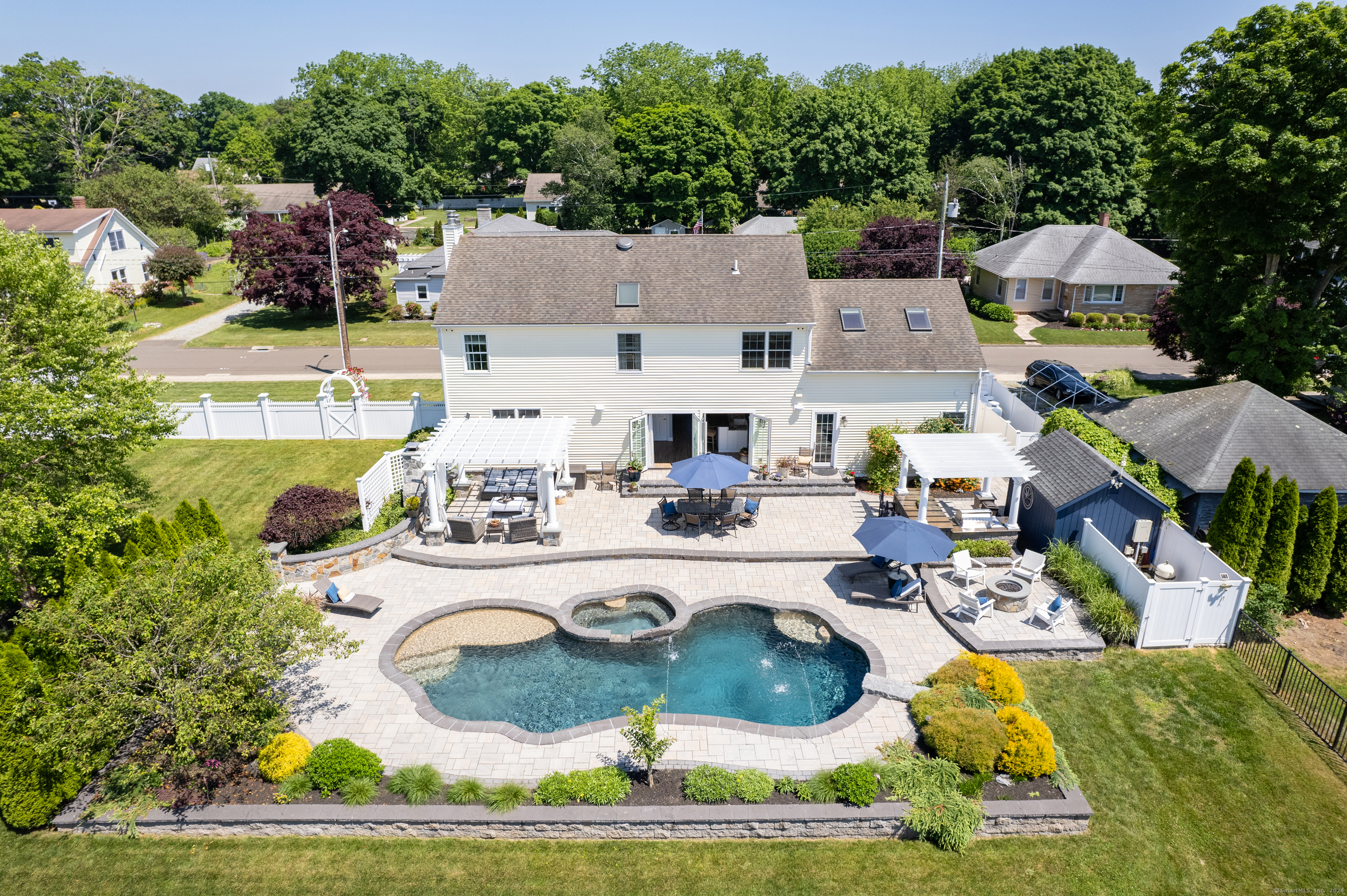 27 Morgan Park Clinton, CT 06413 - Photo 1 of 1 a balcony with table and chairs