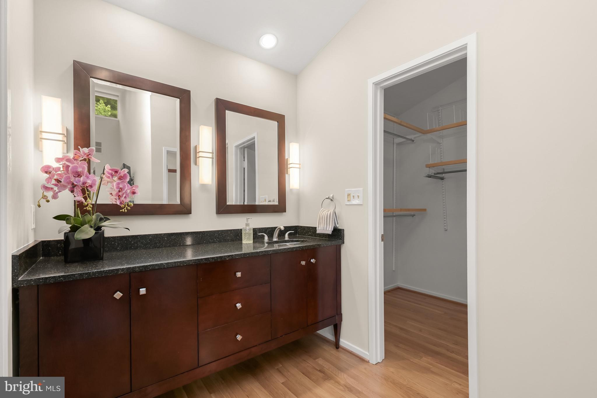 8805 Quiet Stream Court Potomac, MD 20854 - Photo 20 of 42 a kitchen with a sink and cabinets