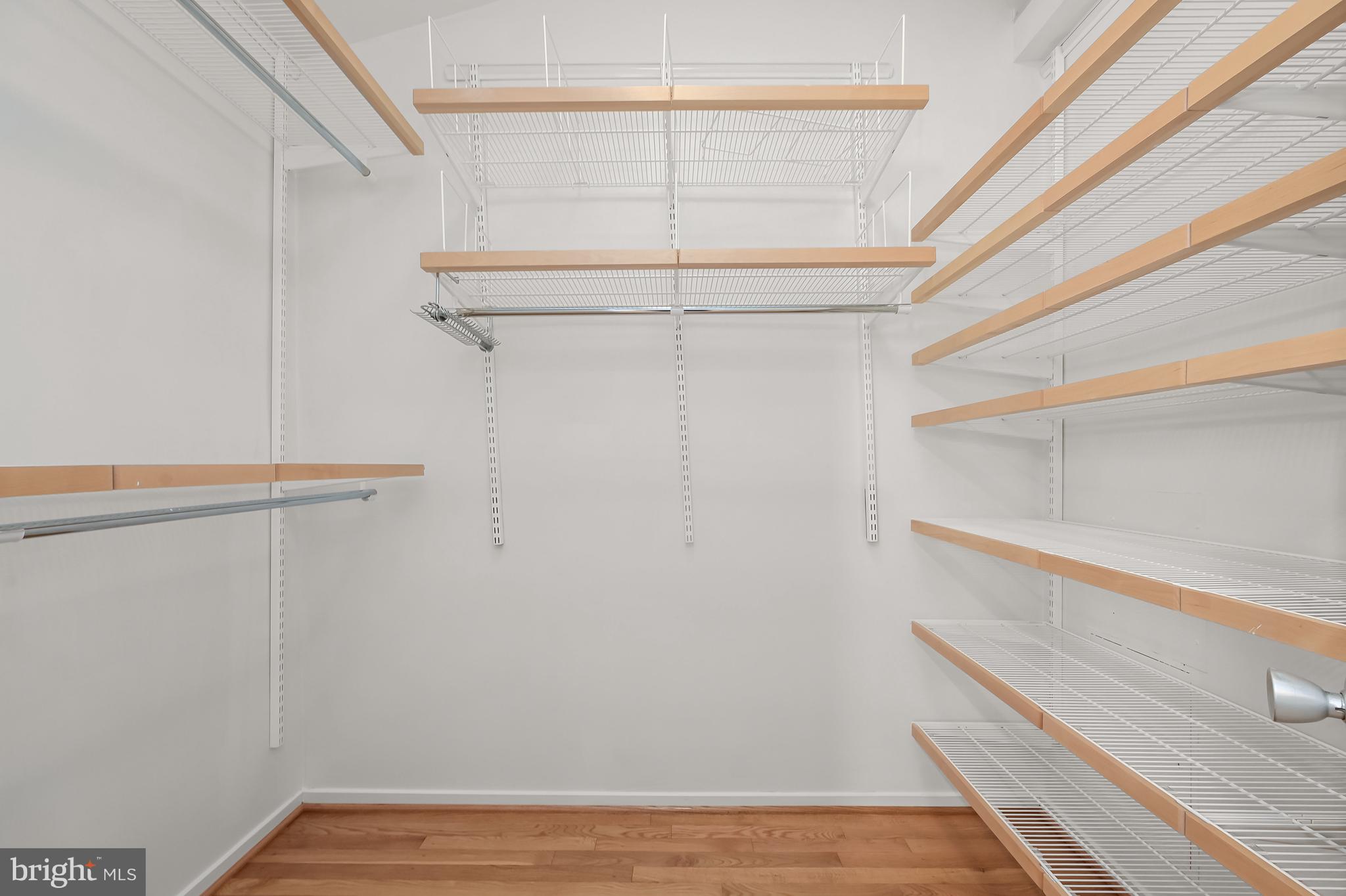 8805 Quiet Stream Court Potomac, MD 20854 - Photo 21 of 42 a view of a room with racks on the wall