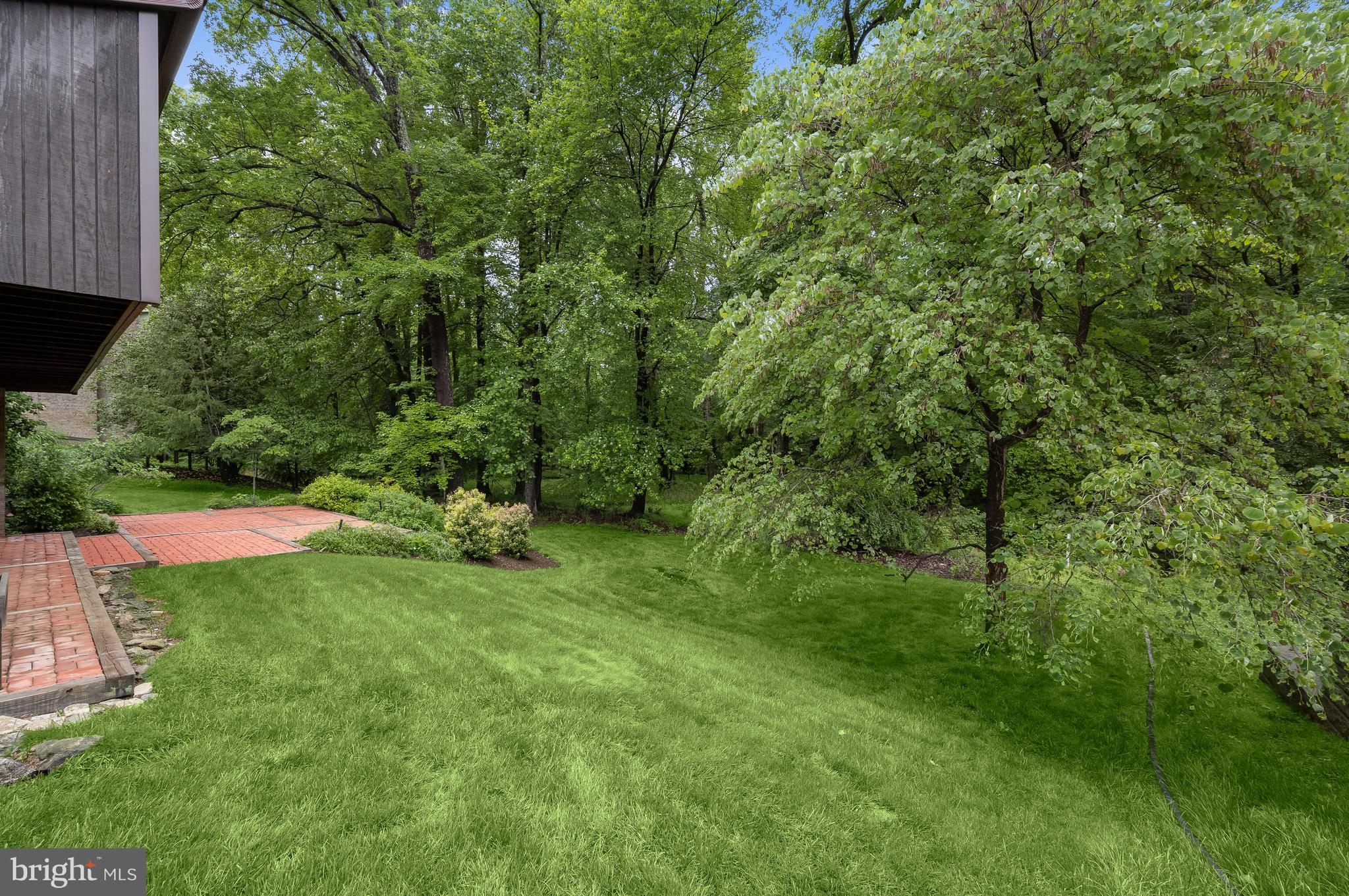 8805 Quiet Stream Court Potomac, MD 20854 - Photo 38 of 42 a view of a backyard