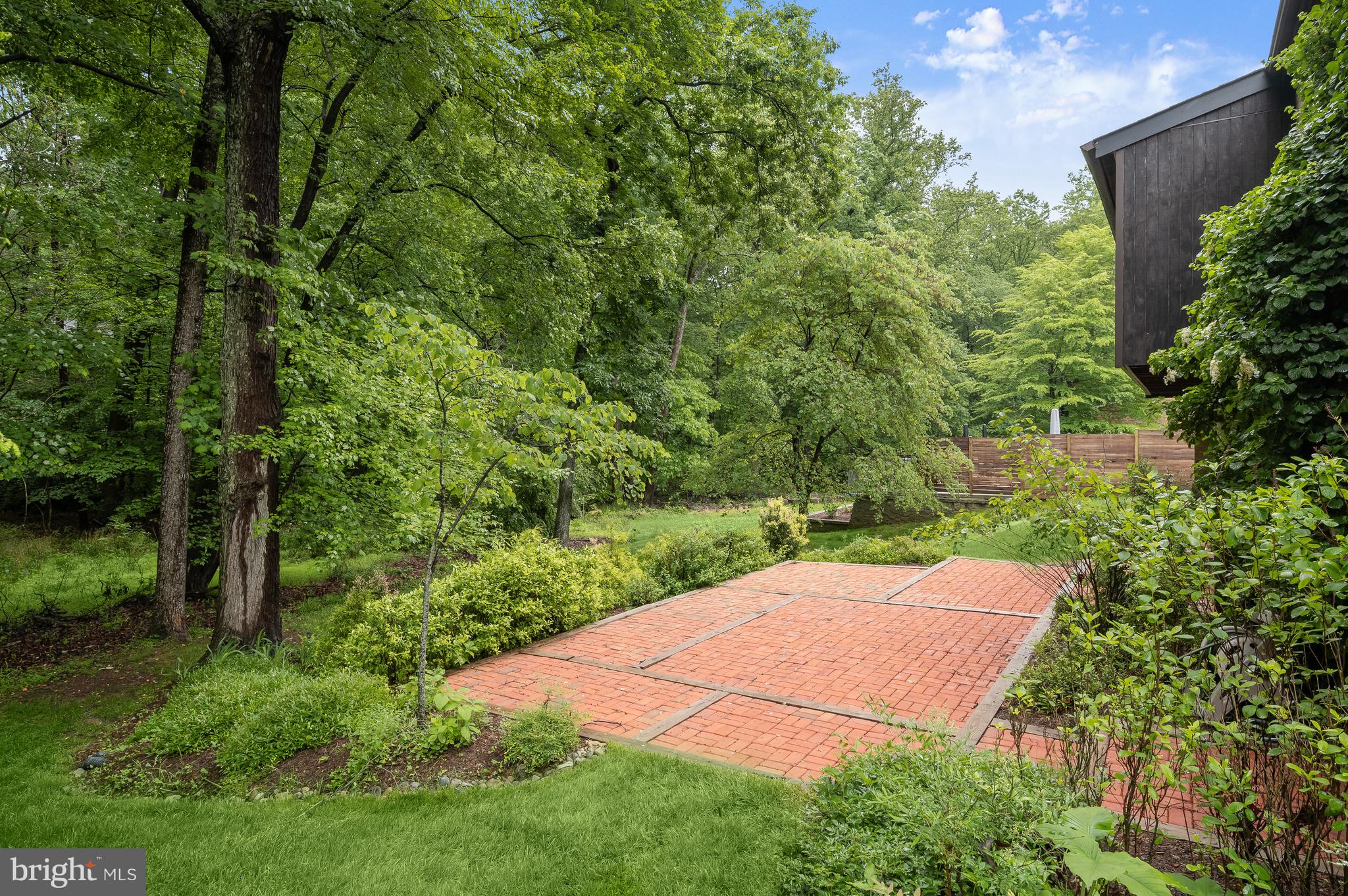 8805 Quiet Stream Court Potomac, MD 20854 - Photo 41 of 42 a view of a backyard