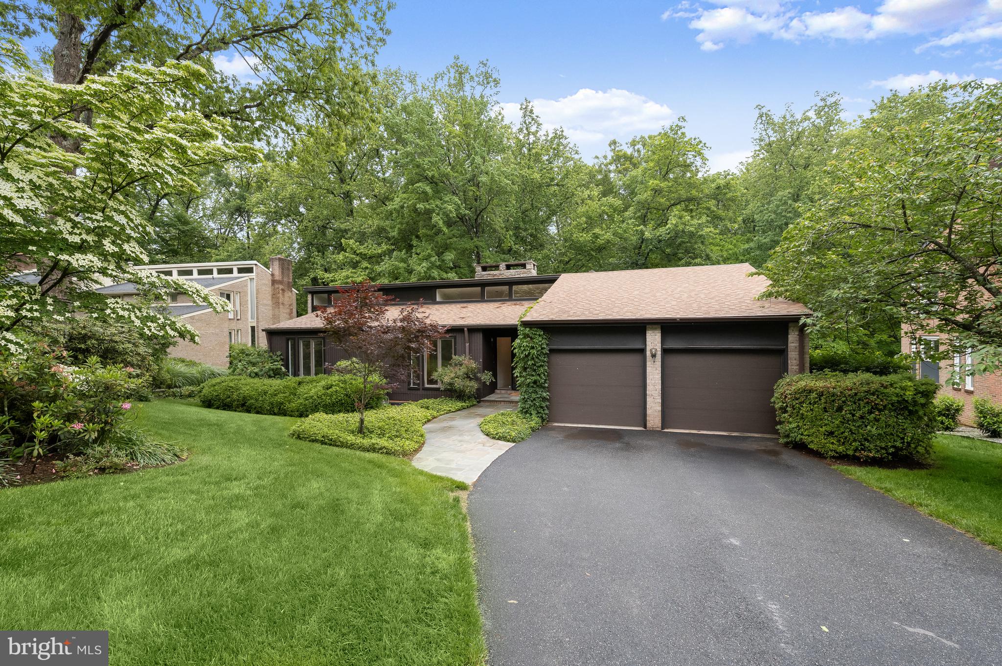 8805 Quiet Stream Court Potomac, MD 20854 - Photo 42 of 42 a view of a house with a yard and tree