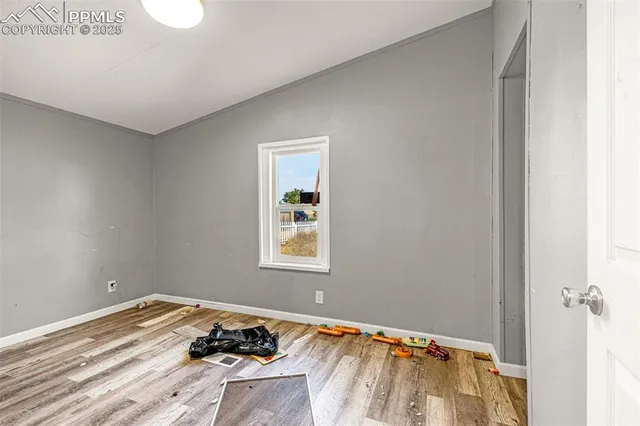 a room with a bed and a window