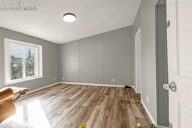 a view of a room with a large window