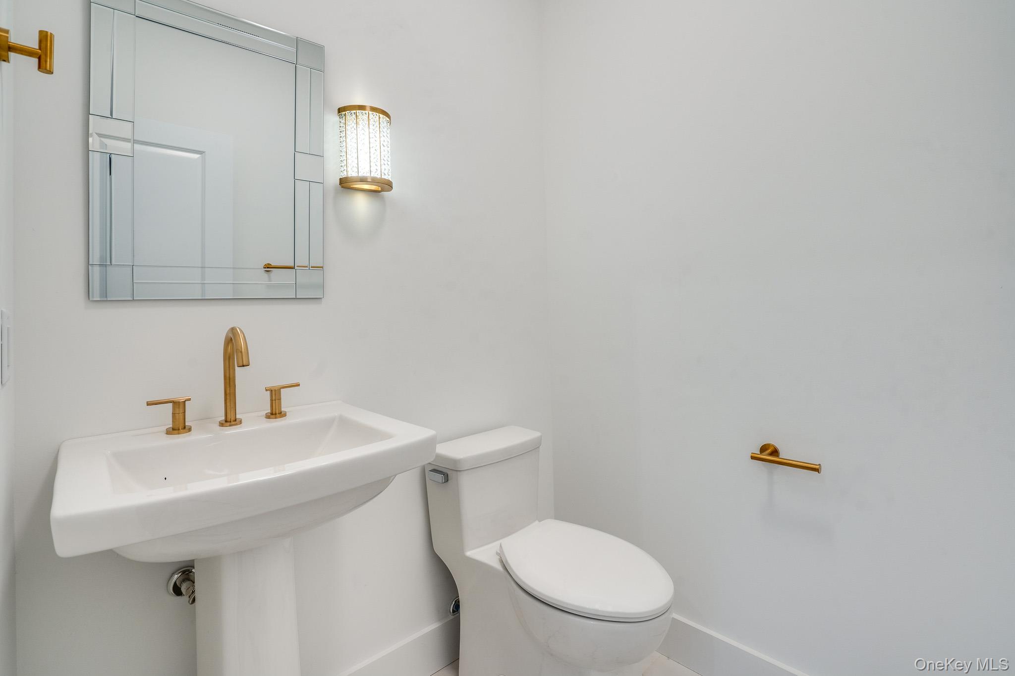 Lot 2 Hillside Lake Road Wappingers Falls, NY 12590 - Photo 13 of 28 a bathroom with a sink a toilet and mirror