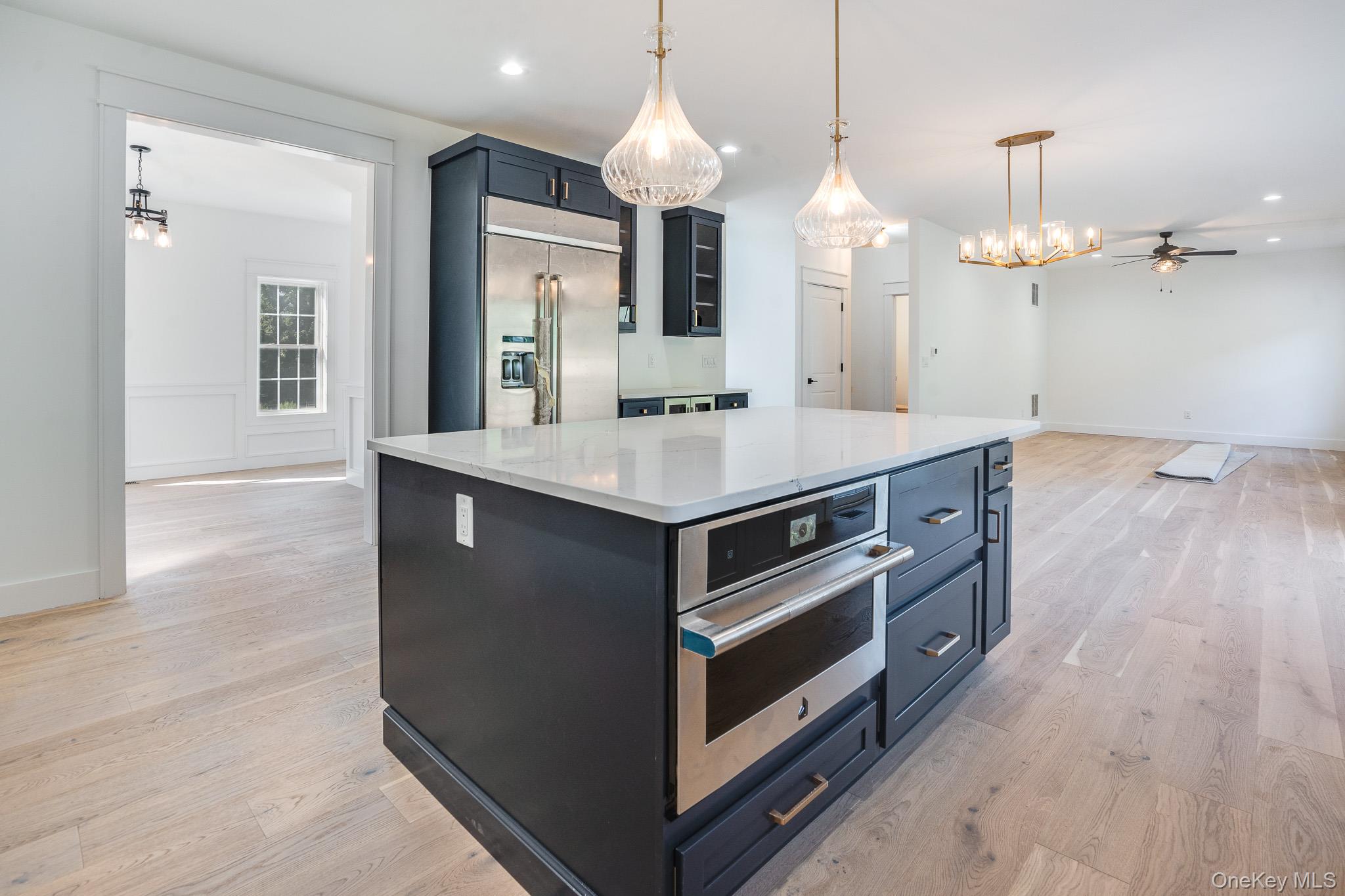 Lot 2 Hillside Lake Road Wappingers Falls, NY 12590 - Photo 10 of 28 a kitchen with a stove and a wooden floor