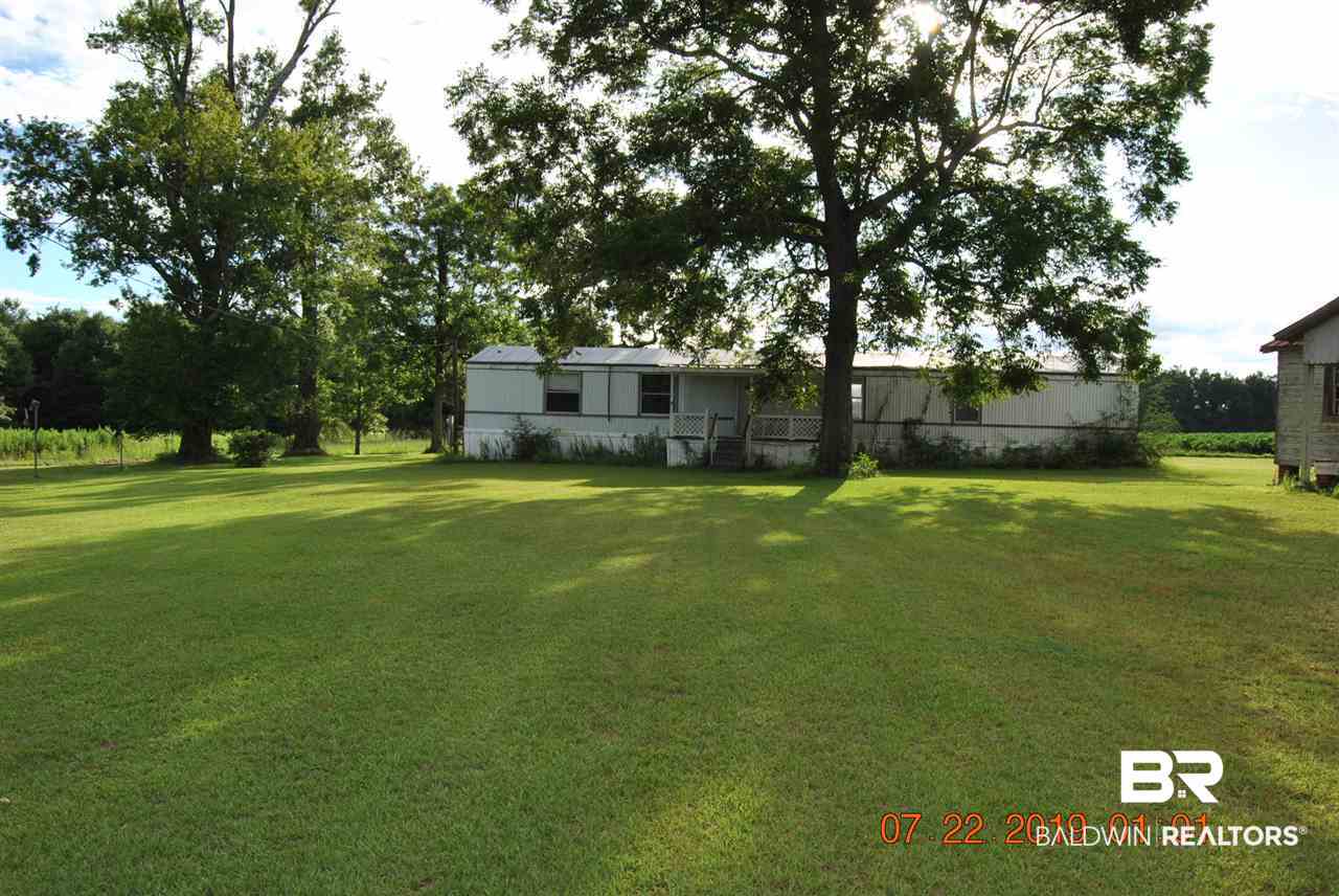 384 Goulsby Farm Road Brewton, AL 36426 - Photo 2 of 5 Mobile home on property 2000 model, needs some TLS