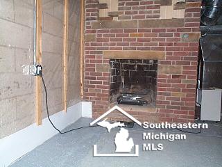 165 East Erie Road Temperance, MI 48182 - Photo 18 of 19 BASEMENT FIREPLACE