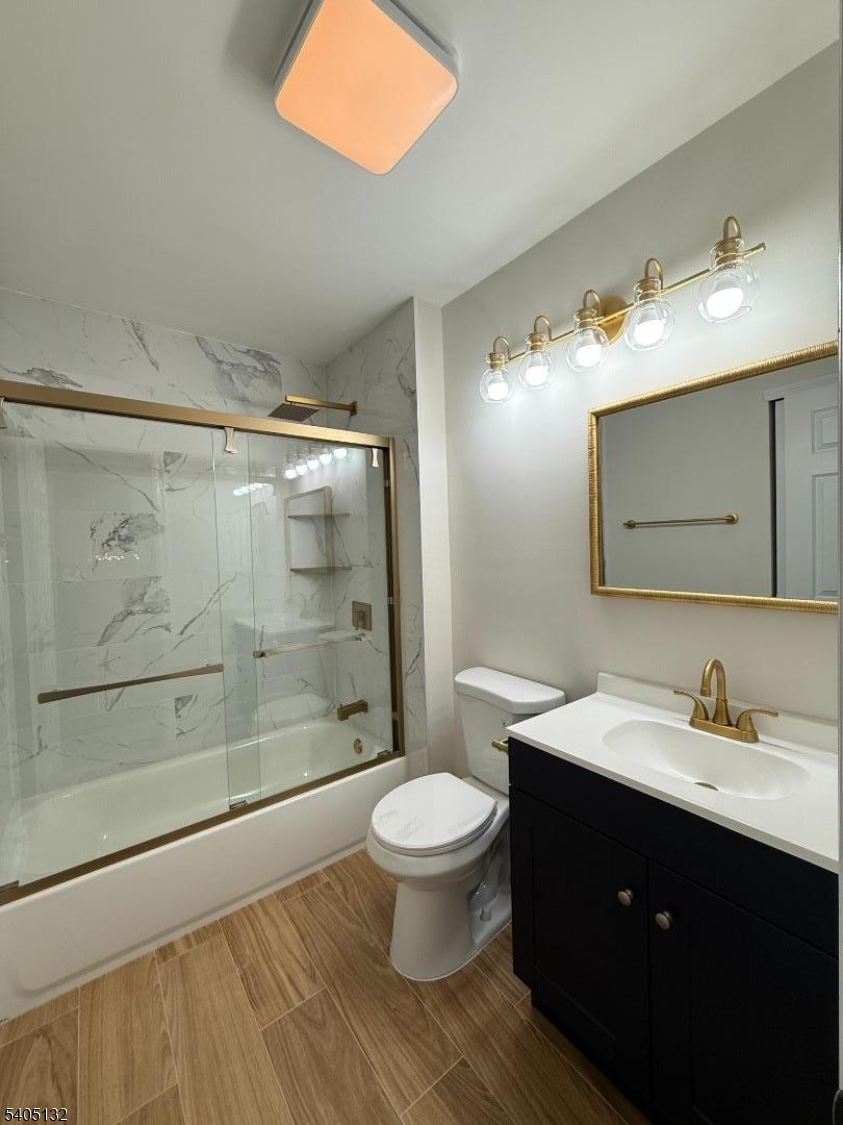 4202 Winder Drive Bridgewater, NJ 08807 - Photo 23 of 26 a bathroom with a sink a toilet and shower