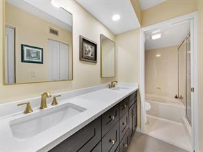 5054 Golfview Court, Unit 1514 Delray Beach, FL 33484 - Photo 11 of 27 a bathroom with a sink double vanity and a tub