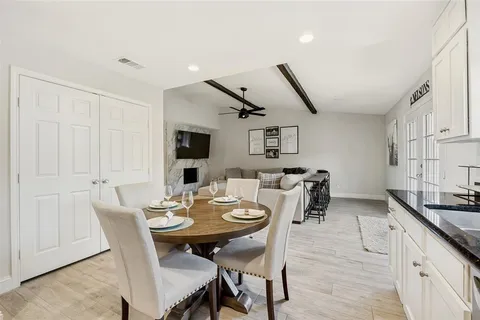 a view of a dining room with furniture