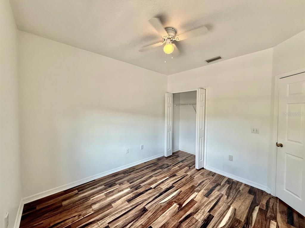 6014 Portsdale Place, Unit 202 Riverview, FL 33578 - Photo 20 of 29 a view of a room with wooden floor