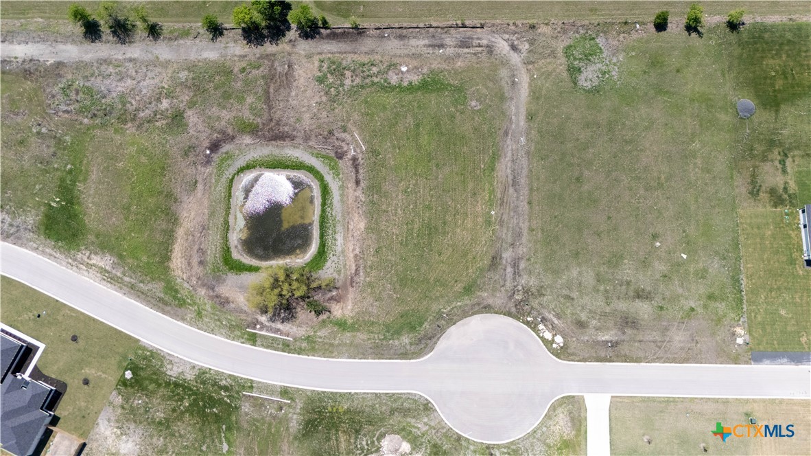 8129 Evenfall Lane Temple, TX 76501 - Photo 4 of 8 a bathroom with a sink and mirror