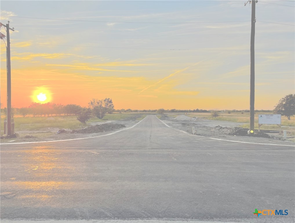 8129 Evenfall Lane Temple, TX 76501 - Photo 6 of 8 a view of a road with an ocean view